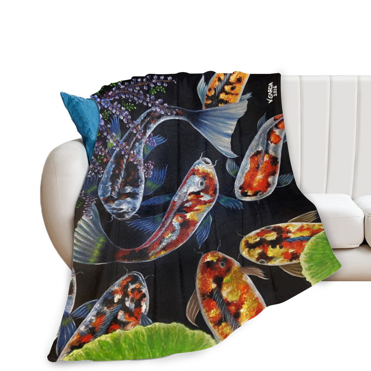 Colorful koi fish print blanket on white couch, soft microfiber fabric, hypoallergenic, anti-pilling, and fast-drying.